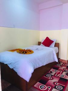 Letto o letti in una camera di Yeti Cozy Hotel