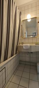 Ванна кімната в Hotel du Roy