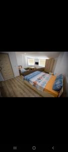 Una cama o camas en una habitación de View Topia Apartments
