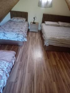Postel nebo postele na pokoji v ubytování Vila Viktori