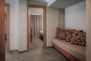 Postel nebo postele na pokoji v ubytování Hotel Hermes Pieria