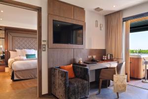 Postel nebo postele na pokoji v ubytování Hôtel Le Week end