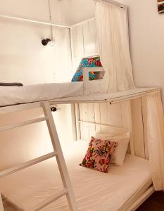 Ein Bett oder Betten in einem Zimmer der Unterkunft Chiza hostel Chiangmai