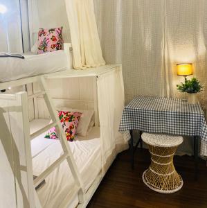 Ein Bett oder Betten in einem Zimmer der Unterkunft Chiza hostel Chiangmai