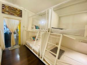 Ein Bett oder Betten in einem Zimmer der Unterkunft Chiza hostel Chiangmai