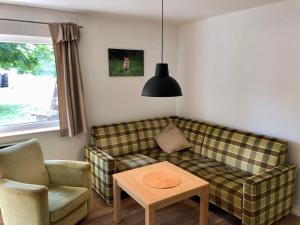 Et sittehjørne på Teilen Sie den Urlaub mit Freunden - Ferienhaus am See mit 2 privaten Wohnungen
