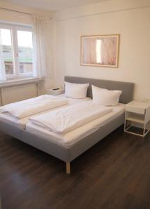 Postel nebo postele na pokoji v ubytování Hotel & Gasthof Wagner