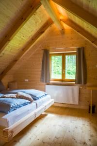 Postel nebo postele na pokoji v ubytování Grobmbauerhütte