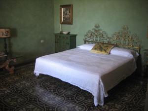Posteľ alebo postele v izbe v ubytovaní B&B Villa Panicucci