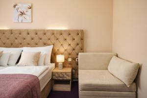 Ein Bett oder Betten in einem Zimmer der Unterkunft Hotel Stella Maris - Style & Comfort