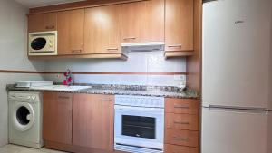 Eldhús eða eldhúskrókur á Apartamento Playa de Daimuz