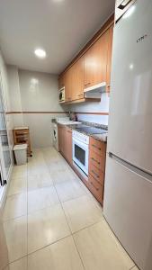 Eldhús eða eldhúskrókur á Apartamento Playa de Daimuz
