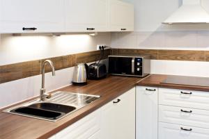 Kuchnia lub aneks kuchenny w obiekcie Apartmány Chata Švadlenka