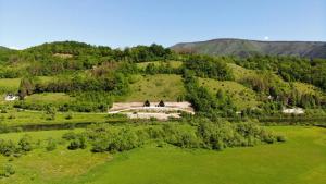 an aerial view of a house on a hill at Bungalov La Repit in Šipovo