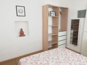 Ένα ή περισσότερα κρεβάτια σε δωμάτιο στο Appartement de charme avec vue panoramique 4 pers