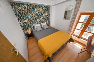 The Lazy Monkey Hostel & Apartmentsにあるベッド