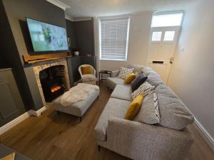 Et tv og/eller underholdning på Free Parking, Outdoor Decking - Flanders Cottage