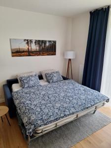 Postel nebo postele na pokoji v ubytování Apartmán v Javorné na Šumavě