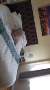 Tempat tidur dalam kamar di Multiplex with a view