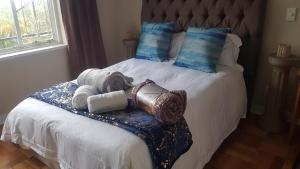 Tempat tidur dalam kamar di Multiplex with a view