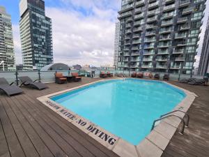a large swimming pool on the roof of a building at Hyatt Regency Toronto in Toronto