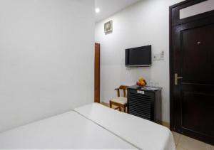Televisor o centre d'entreteniment de Lotus Rock Hotel Đà Nẵng
