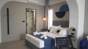 Postel nebo postele na pokoji v ubytování Seaside suite