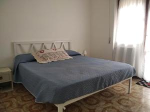 Ένα ή περισσότερα κρεβάτια σε δωμάτιο στο Casa Chianciano Terme e Relax