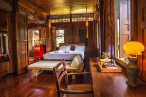 Imagem da galeria de Baankwaeom Boutique Homestay Amphawa em Ban Wat Bot