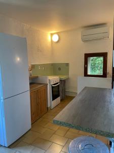 Køkken eller tekøkken på Gîte dans les Cévennes