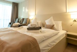Postel nebo postele na pokoji v ubytování Spa Hotel Diana
