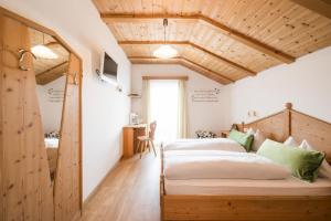 Postel nebo postele na pokoji v ubytování Boutique Pension Erlacher - Adults Only