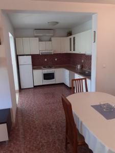 Kuchyňa alebo kuchynka v ubytovaní Vita Apartments