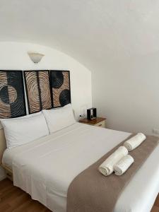 Tempat tidur dalam kamar di Sperlonga Paradise Central Loft