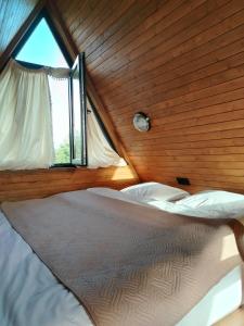 Ένα ή περισσότερα κρεβάτια σε δωμάτιο στο Big Family