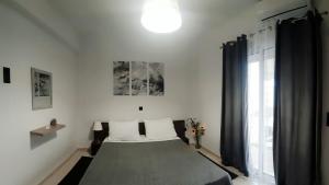 Posteľ alebo postele v izbe v ubytovaní Eva apartment