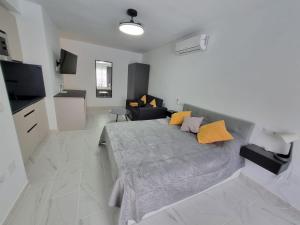 Posteľ alebo postele v izbe v ubytovaní Seascape - Tranquil Studio Apartment