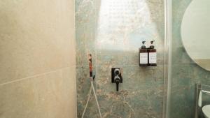 Vannituba majutusasutuses Manere Suites