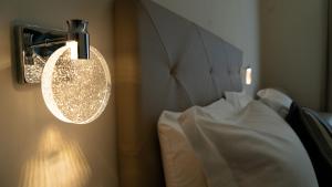Voodi või voodid majutusasutuse Manere Suites toas