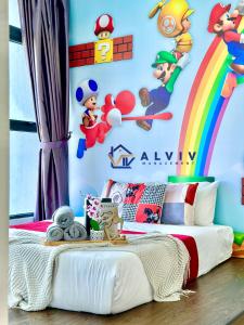 ein Schlafzimmer mit Regenbogen- und Marino-Zeichen an der Wand in der Unterkunft Atlantis Melaka I 5-11pax I 5min JonkerSt By Alviv Management in Malakka