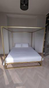 a bed with a canopy in a room at Villa Giordana in Casalborgone