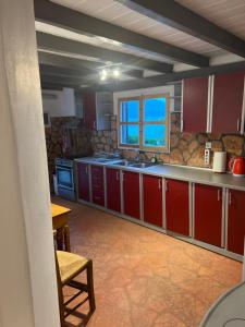 Kuchyň nebo kuchyňský kout v ubytování Hamre Apartments (Nicholas)