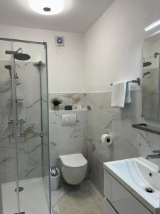 Koupelna v ubytování Apartments Marija