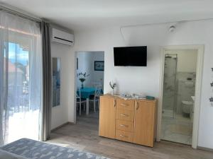 TV a/nebo společenská místnost v ubytování Apartments Marija