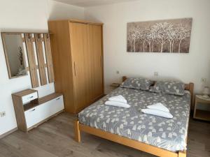 Postel nebo postele na pokoji v ubytování Apartments Marija