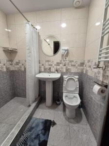 Un baño de NQ Guest house