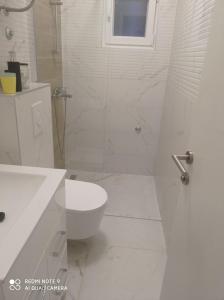 Ένα μπάνιο στο Apartmani IVO Živogošće