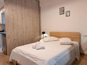 Ένα ή περισσότερα κρεβάτια σε δωμάτιο στο Mini Suite 5