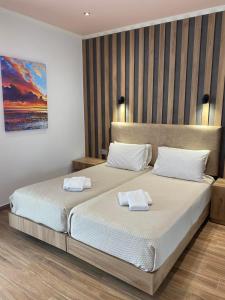 Posteľ alebo postele v izbe v ubytovaní Selefkos Palace