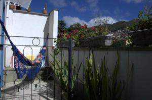 Uma varanda ou terraço em Acapela Hospedagem mais 26 fotografias
